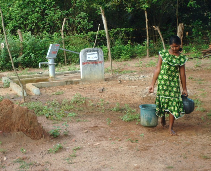 A woman fetching water