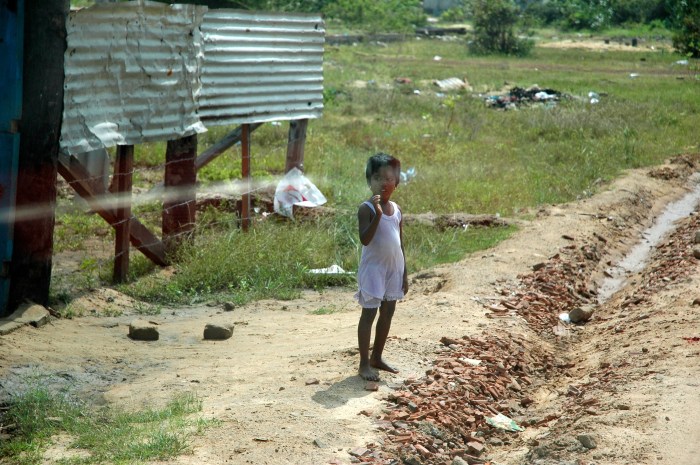 Child waiting for handouts