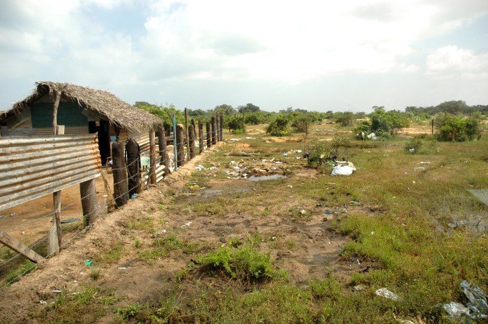 Unearthed scattered belongings, hurriedly buried by fleeing civilians