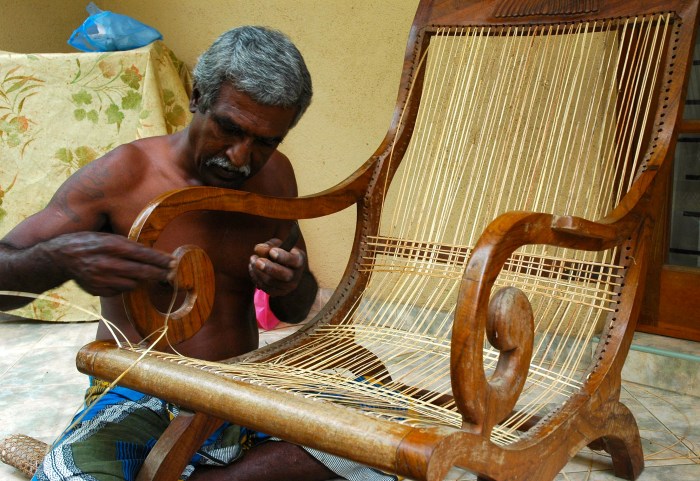 Traditional can-weaver repairing my recliner