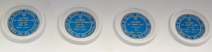 The blue plaques with Governors' names