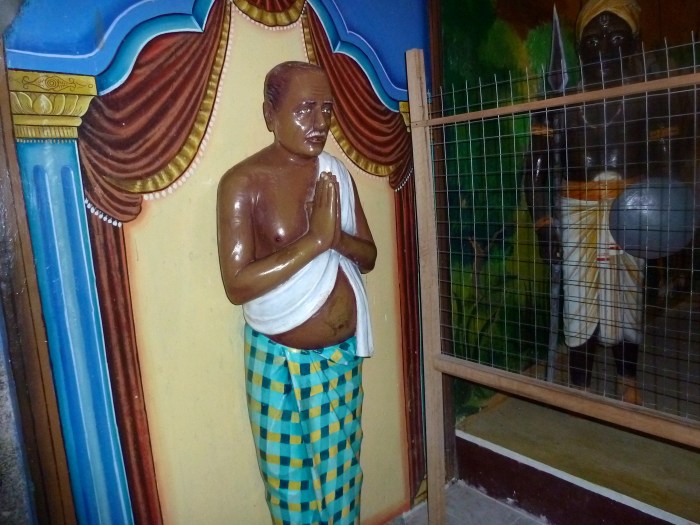 Statue of Yonis, the man who renovated the Buddha statue 200 years ago